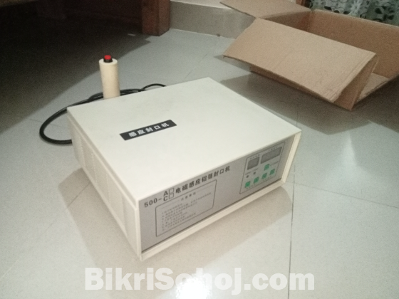 বোতলের মুখ লাগানোর মেশিন